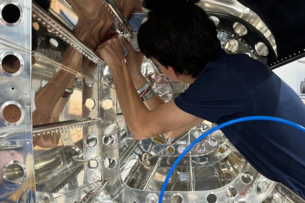 RAHS CTE student working on an airplane