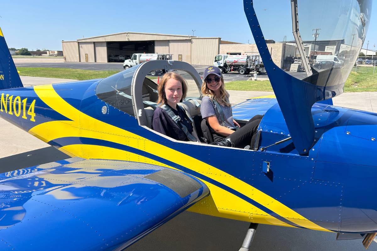 Rising Aviation High School students in a plane